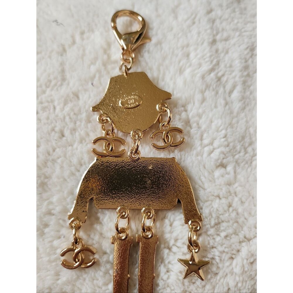 CHANEL Black and Gold Enamel Charm Doll with Pink Heart Sunglasses - Picture 7 of 7